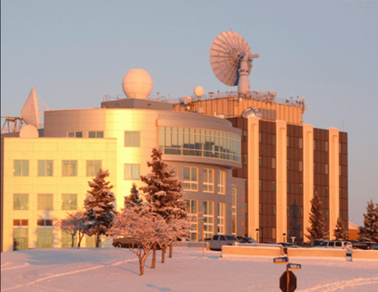 The Alaska Satellite Facility uses the 10-meter receiving antenna on top of UAF’s Elvey Building, at right, on the west ridge of the UAF campus. The building at left houses the International Arctic Research Center. Photo by Ned Rozell.
