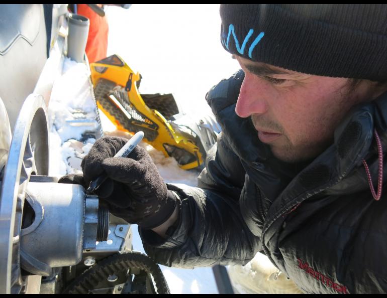 A scientist using equipment.
