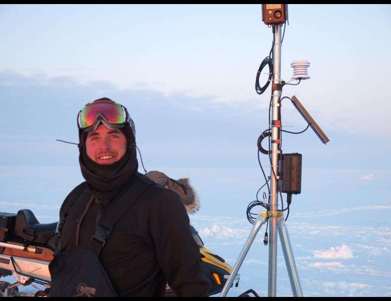 Photograph of scientist at "Teshekpuk Lake Observatory". 