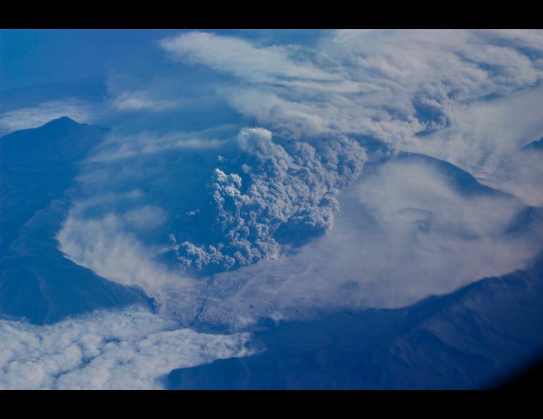 Mount Okmok erupts explosively on August 3, 2008. Photo by Burke Mees, Alaska Airlines.