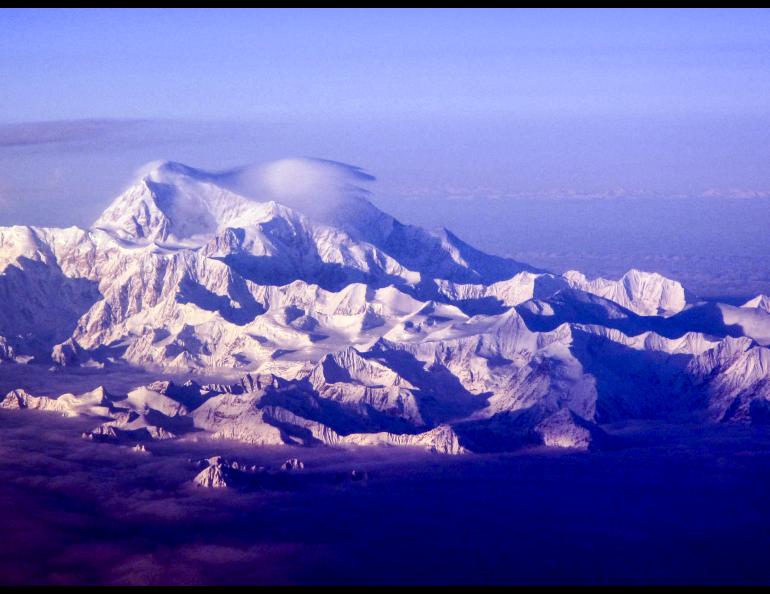 Denali stands at 20,310 feet as seen from a commercial flight between Anchorage and Fairbanks. Photo by Ned Rozell.