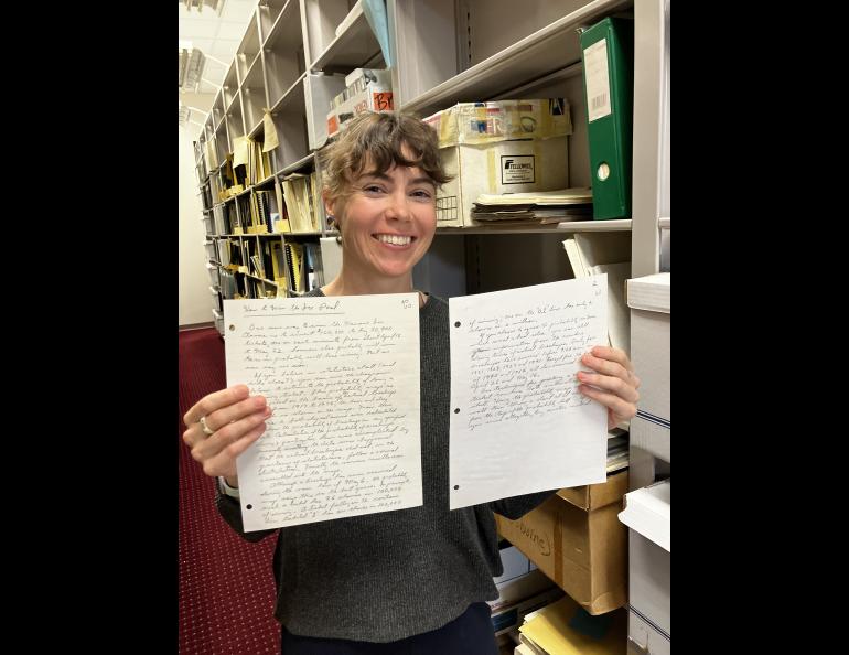 Person holding handwritten article