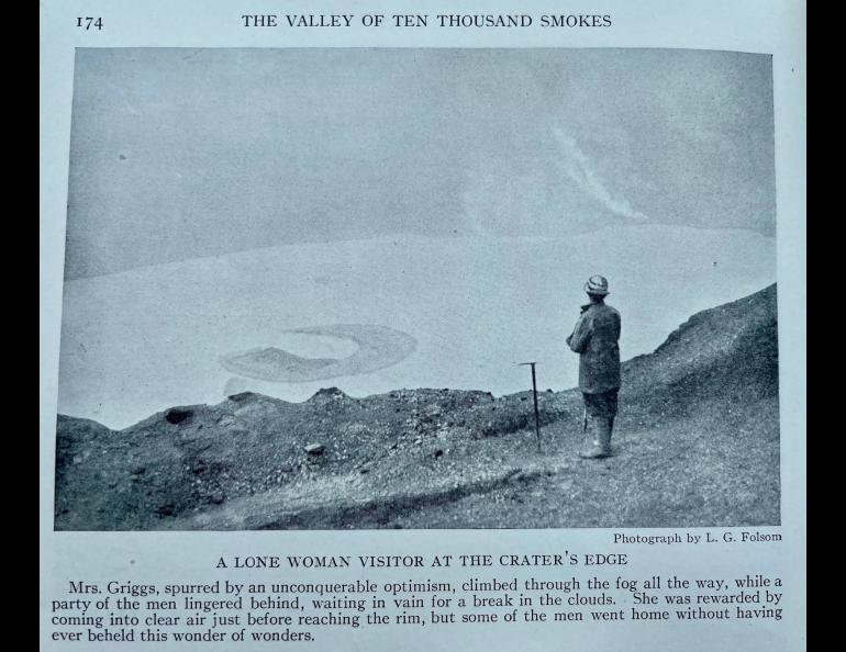 Laura Griggs, wife of botanist Robert Griggs, stands at the rim of Katmai Caldera, a crater located where the top of Mount Katmai stood before the 1912 eruption. Photo by L.G. Folsom, from the book “The Valley of 10,000 Smokes” by Robert Griggs.