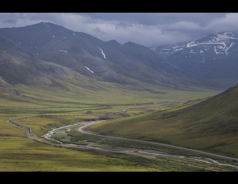 An aerial image of the Dalton Highway and the trans-Alaska pipeline