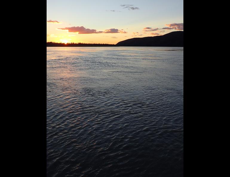 The Yukon River flows toward Circle, Alaska. Two-thirds of all the flowing water in Alaska makes its way into the Yukon. Photo by Ned Rozell.