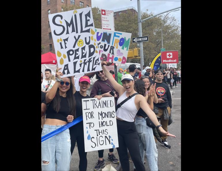 Fans of the New York City Marathon hold signs for some of the 50,000 runners who passed them on Nov. 6, 2022. Photo by Ned Rozell.