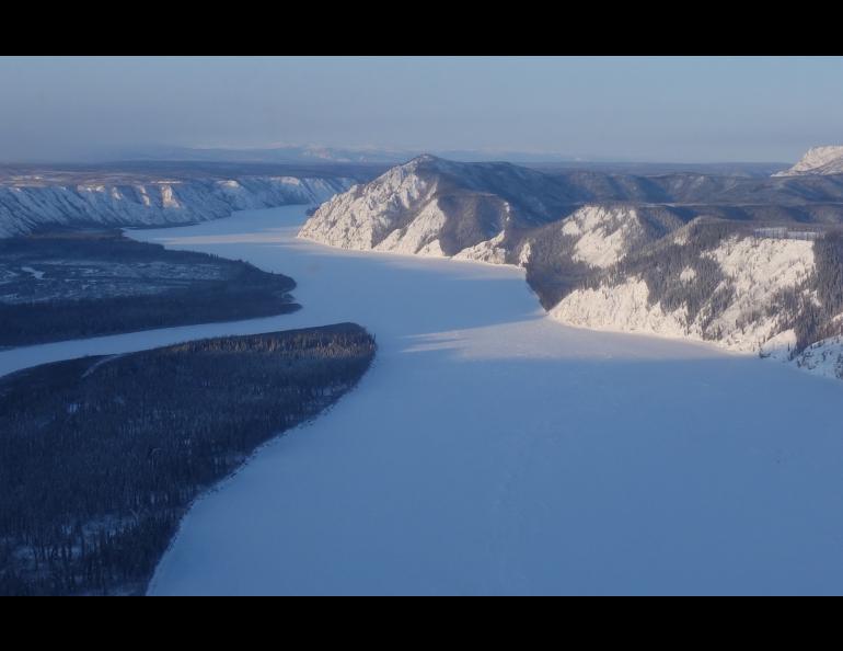 The Yukon River downstream of Slaven’s Roadhouse, showing Woodchopper Bluff, in early February, 2020. Photo by Adam Bucki.