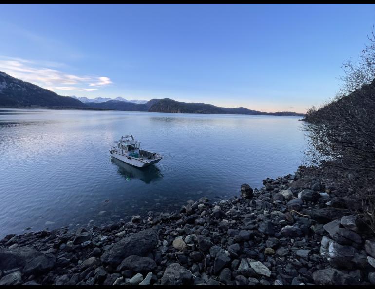 A water taxi sits just offshore near the Homer site. Each visit to the site was bookended by a ride across Kachemak Bay in the taxi. Photo by Sara Wilbur