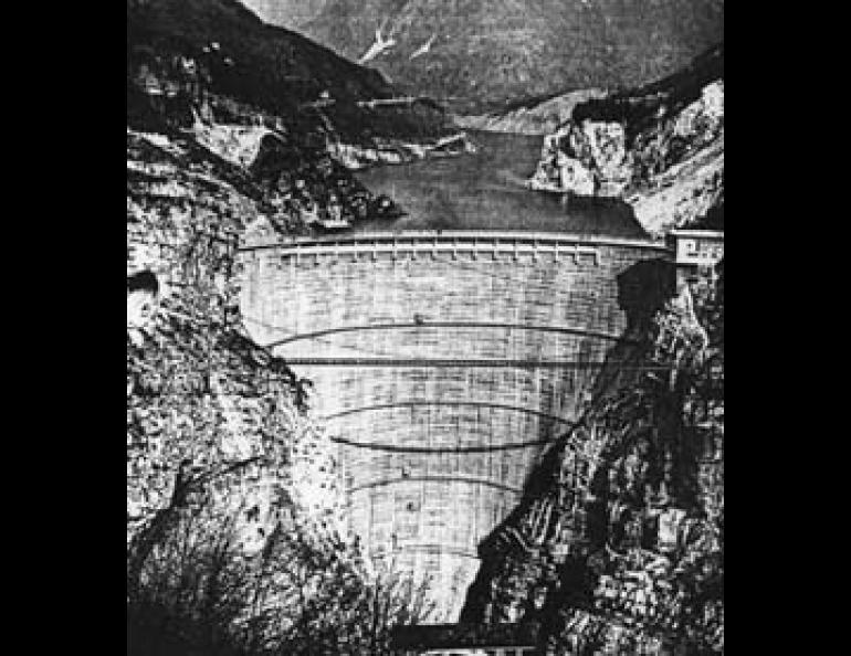 The Vanont Dam in Italy. In 1963 heavy rains and intermittent load-induced earthquakes dislodged the piece of mountainside marked by the scar in the right of the photo. Falling into the reservoir, it created a wave which swept over the dam at almost half its own height, drowning 2,600 people in the valley below. 