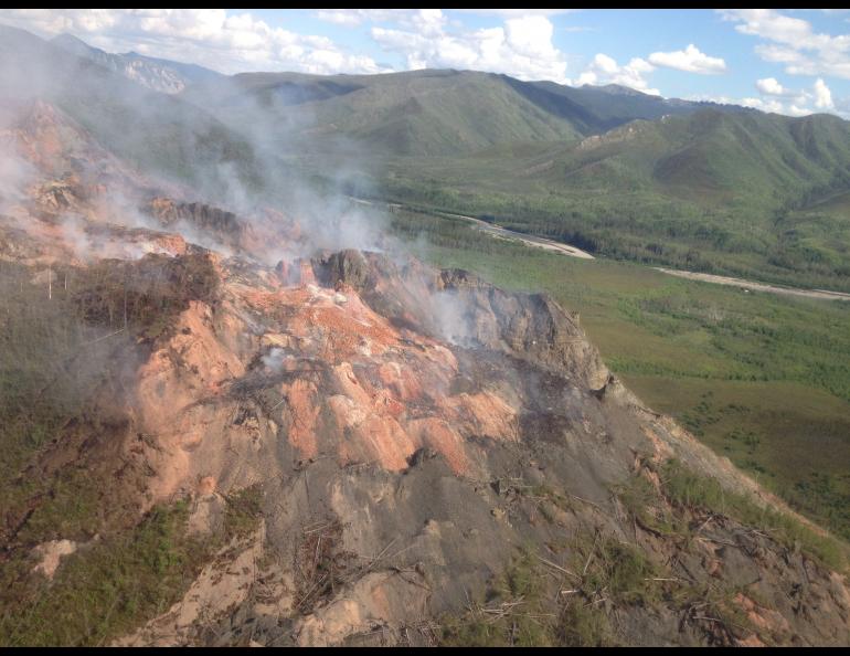 An aerial view of the Windfall Mountain Fire with the Tatonduk River in the background. National Park Service photo by Linda Stromquist.