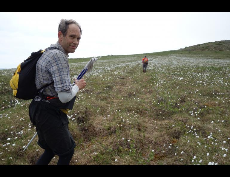 Mark Ross, organizer of the AlaskAcross traverse, hikes behind Jay Cable of Fairbanks. Photo by Ned Rozell.