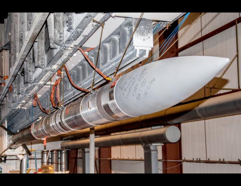 A 45-foot NASA sounding rocket set for launch in February, 2017 at Poker Flat Research Range north of Fairbanks. Workers there wrote on the nose cone of the aurora-research rocket a frequent quote from range founder Neil Davis: "'We're in a building situation.' T. Neil Davis, Feb. 1, 1932 - Dec. 10, 2016." NASA photo.