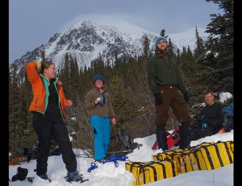 With Panorama Mountain in the background, from left, Lynn Kaluzienski, Elizabeth Berg, Cole Richards and Carl Tape take a break. Photo by Ned Rozell.