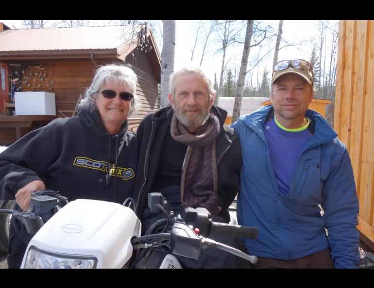 Lanette and Mike Phillips with Ned Rozell at the Phillips' home near Copper Center. Photo by Kristen Rozell.