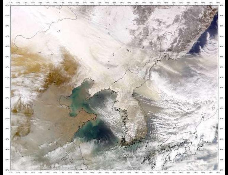 A massive cloud carrying sand and dust from deserts in Asia moves east over North and South Korea on its way to the Pacific Ocean on January 2, 2000. A similar dust cloud recently reached Alaska. Image provided by the SeaWiFS Project, NASA/Goddard Space Flight Center, and ORBIMAGE
