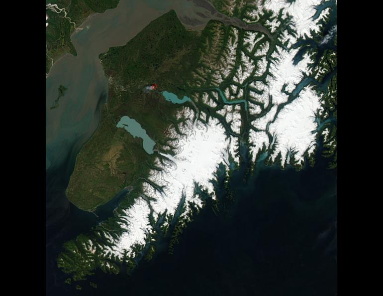 An image of the Kenai Peninsula on June 15, 2015, acquired from the Moderate Resolution Imaging Spectroradiometer aboard the Aqua satellite. The red box in this cropped image is a wildfire. Image credit: Jeff Schmaltz, NASA.