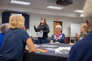 Becky Lindsey, GI Communications director, opened the 2026 GI reunion in the Globe Room. Photo by Eric Marshall