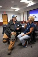 Dale Pomraning (left) in conversation with Jackie Dashiell at the 2026 GI reunion. Photo by Eric Marshall