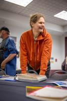 Ashley Fischer enjoys watching activities going on at the 2026 GI reunion. Photo by Eric Marshall