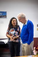 Anupma Prakash, left, shares a memory with Hans Nielsen. Photo by Eric Marshall