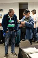 Paul Layer and Steve Estes chat at the 2026 GI reunion. Photo by Tucker Forbes