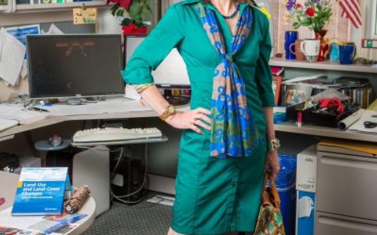 Nicole Mölders poses in her office at the Akasofu Building. Along with her career as an atmospheric scientist at UAF, she is also the author of a fashion blog, High Latitude Style. UAF photo by JR Ancheta.
