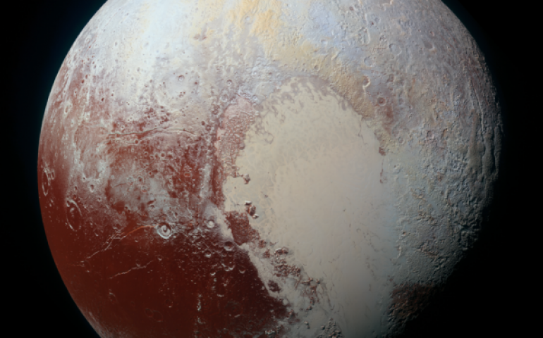 This high-resolution, enhanced color view of Pluto was taken on July 14, 2015. Photo by NASA.