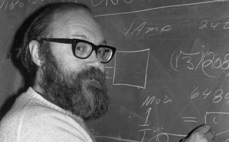 Merritt Randolph Helfferich at the blackboard. UAF GI photo.