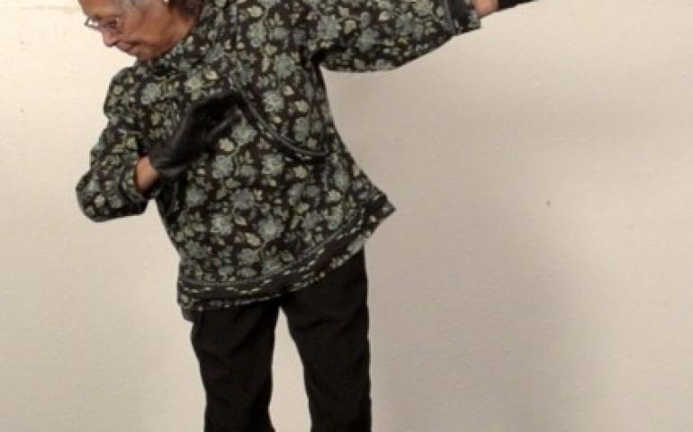 Fannie Akpik, of Barrow, demonstrates the Inupiat Northern Lights Dance. Photo courtesy of Cultural Connections.