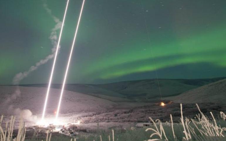 Two rockets rise from Poker Flat Research Range in this composite photograph taken the night of Jan. 25-26, 2015. The aurora is visible across the sky. The 2020 rocket launch window opens Jan. 26. Photo by J. Adkins, NASA.