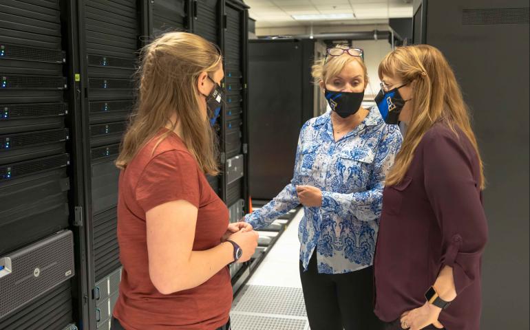 Left to right, Athena project manager Helena Buurman of the Alaska Satellite Facility; Karen Diener, National Geospatial-Intelligence Agency system engineering and technical assistant; and Nettie La Belle-Hamer, director of the Alaska Satellite Facility and UAF’s interim vice chancellor for research