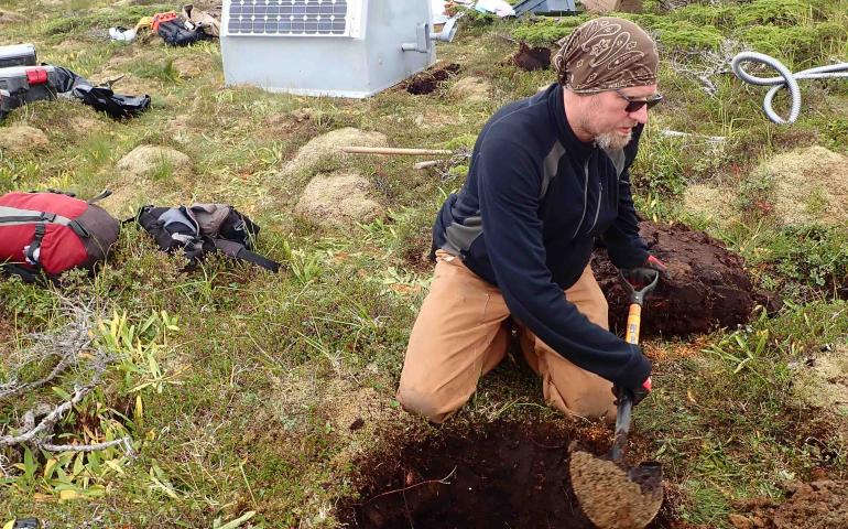 UAF Geophysical Institute associate professor Ronni Grapenthin digs the seismometer hole at a new Alaska Volcano Observatory monitoring site on the northwest side of Mount Edgecumbe in late August 2023. Photo by Max Kaufman.