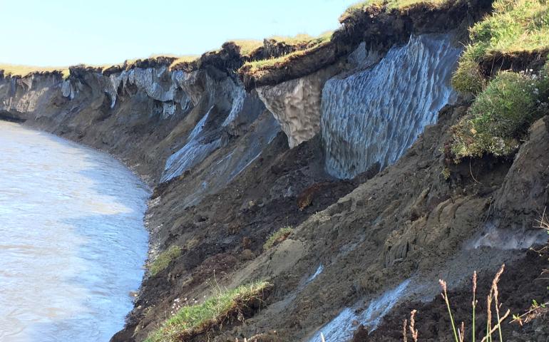 Permafrost stores large amounts of carbon that may be released to ecosystems and the atmosphere when permafrost thaws. These bluffs are on the bank of Alaska’s Canning River in 2019. USGS photo.