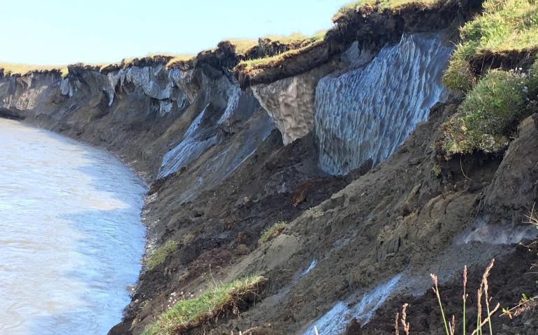 Permafrost stores large amounts of carbon that may be released to ecosystems and the atmosphere when permafrost thaws. These bluffs are on the bank of Alaska’s Canning River in 2019. USGS photo.