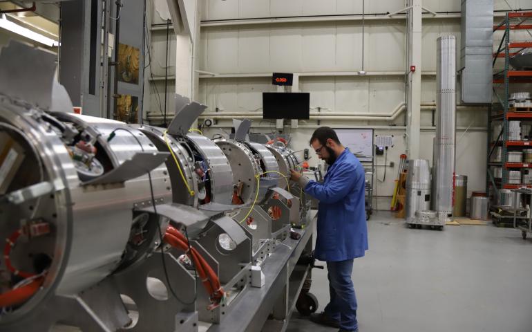 A NASA technician works on the payloads of one of the AWESOME mission’s three rockets at the space agency’s Wallops Flight Facility in Virginia. The rocket and payload components were then shipped to Poker Flat Research Range. Photo by Berit Bland/NASA