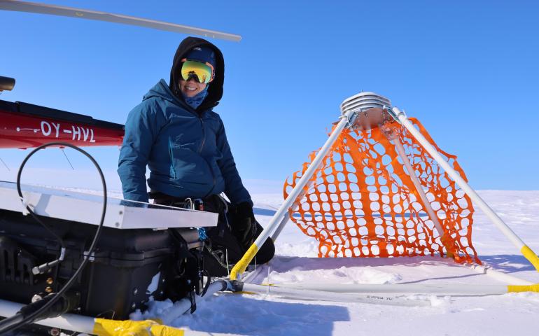 UAF graduate student researcher Amy Jenson at one of the instrument sites on Jakobshavn Glacier. Photo by Martin Truffer
