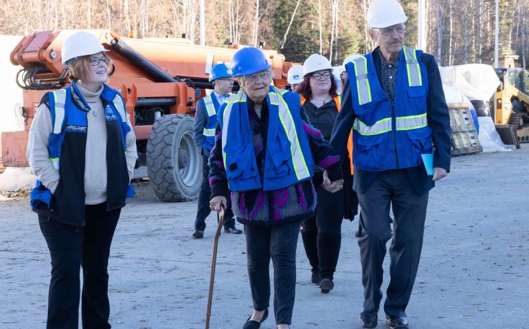Marita and Walt Babula walk hand in hand Oct. 11, 2025, at the site of a 65-seat planetarium. The Babulas made a previously anonymous donation of $7.4 million to the project. Photo by Bryan Whitten