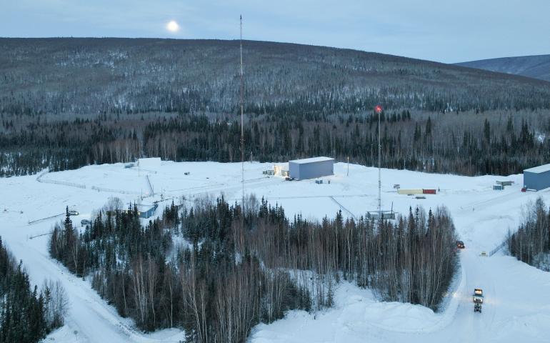 Retractable coverings — the blue rectangular structures — cover two of the four launchpads at Poker Flat Research Range north of Fairbanks. Photo by Bryan Whitten