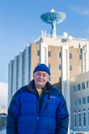 Carl Benson outside the Geophysical Institute building on the Fairbanks campus in February 2016. Photo by Todd Paris