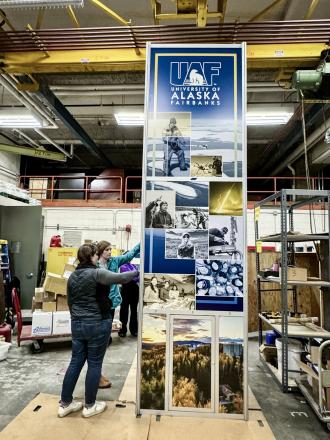 Setting up the tower in the Elvey garage. Photo by Vicki Daniels