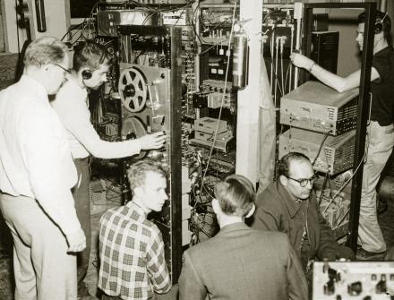  Researchers from the Geophysical Institute track the Sputnik 1 satellite in the Ballaine Lake tracking station, October 1957. From left are Bob Merritt, Joe Pope, Pete Michelow, Gordon Little, Glen Stanley and Ernest Stiltner. Photo courtesy the Geophysical Institute, UAF. 