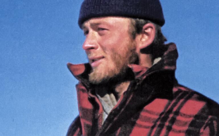 Carl Benson pauses during one of his traverses of Greenland in 1953, when he was 25. Photo courtesy of the UAF Geophysical Institute.