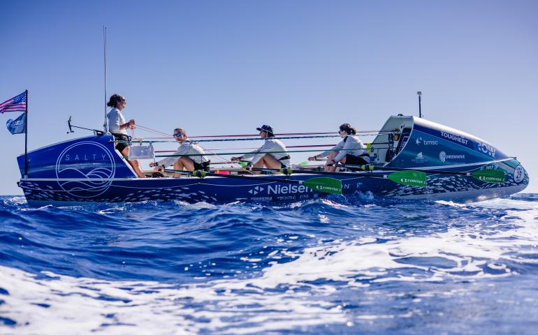 From left, Lauren Shea, Chantale Bégin, Isabelle Côté and Noelle Helder propel their 28-foot boat Emma off the coast of Florida during a training run for their crossing of the Atlantic Ocean. Photo courtesy Noelle Helder.