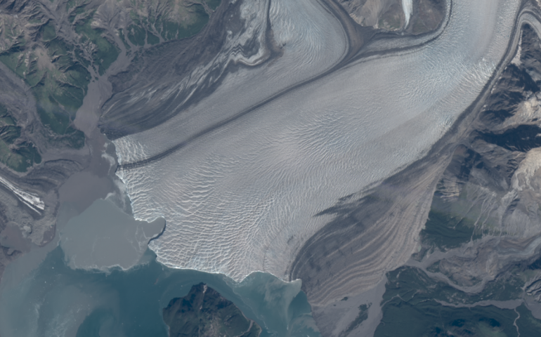 A recent “embayment” bite out of the face of Hubbard Glacier, which may indicate the presence of a subglacial river. Image courtesy Mark Fahnestock. 