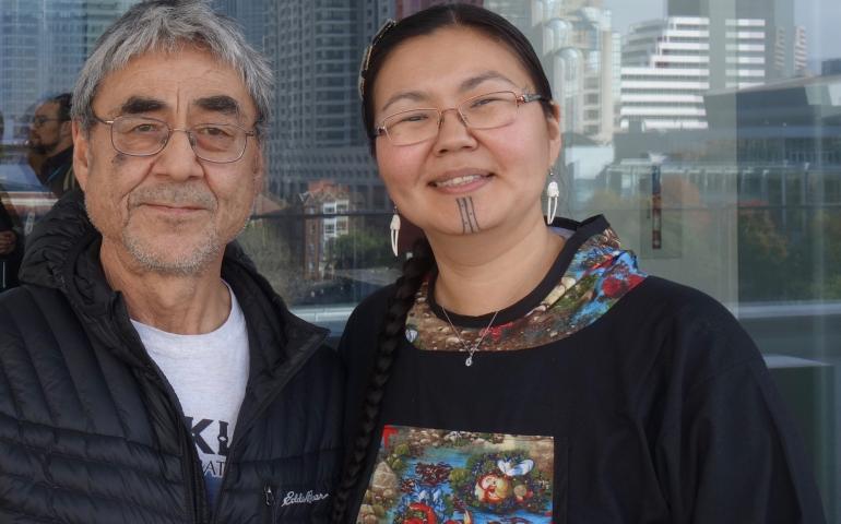 Jerry Ivanoff, from Unalakleet, and Mellisa Johnson of Anchorage and Nome, outside the Moscone Center in downtown San Francisco. They traveled to the Fall Meeting of the American Geophysical Union at the invite of scientists who wrote the 2019 Arctic Report Card. Photo by Ned Rozell.
