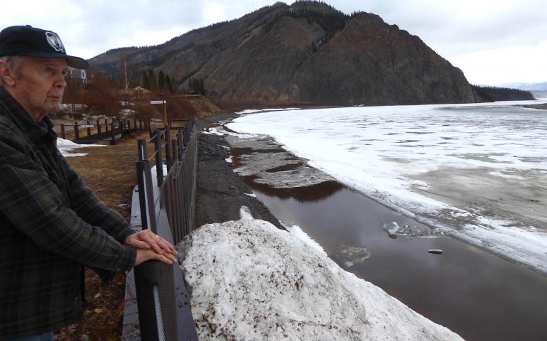 John Borg of Eagle, Alaska, looks out to a sheet of ice on the Yukon River on May 6, 2022, a few hours before it broke up. Photo by Ned Rozell.