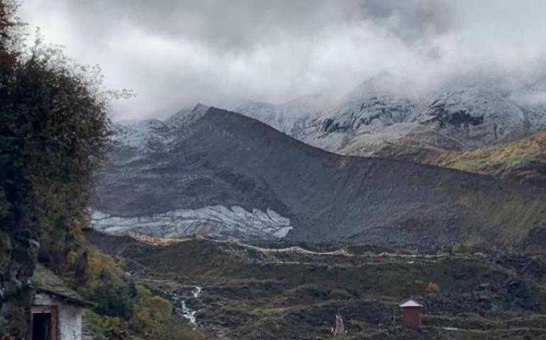 Martin Truffer of the Geophysical Institute of the University of Alaska Fairbanks recently studied this rock-covered glacier in Tibet to find its thickness. Photo by Martin Truffer.