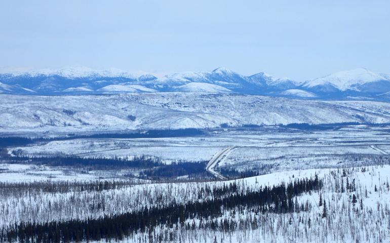 The Dalton Highway winds through the Jim River and Prospect Creek valleys in northern Alaska, where an official thermometer registered Alaska’s all-time low of minus 80 degrees F on Jan. 23, 1971. Photo by Ned Rozell. 