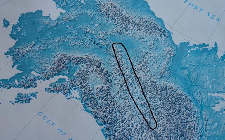 The Tintina Trench, a straight line between mountains, reveals the Tintina Fault. The Tintina Trench combines with the Rocky Mountain Trench to extend all the way to Montana. Ned Rozell image.