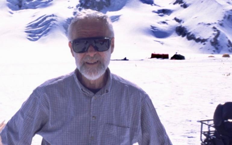 Glaciologist Will Harrison on Black Rapids Glacier. Photo by Martin Truffer.